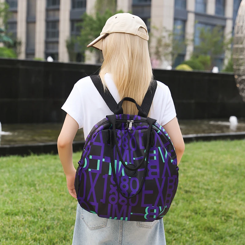 Mochila de viaje impermeable para mujer, bolso de hombro con estampado de letras, elegante, para viaje