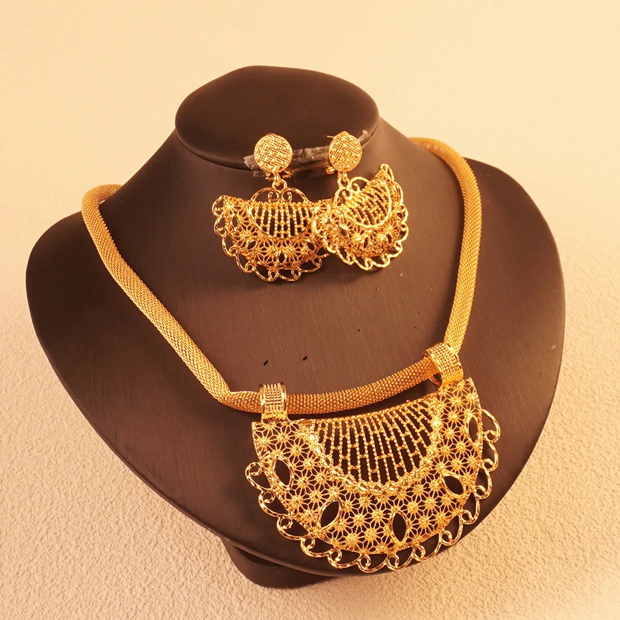 9999 gold love jewelry from a Middle Eastern Dubai lady - floral design necklace and earrings, perfect for back-to-school gifts