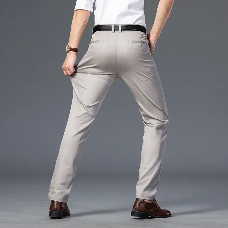 Calça comprida elástica masculina, tubo reto, tamanho solto, versátil, lazer, moda, primavera e outono, 2022