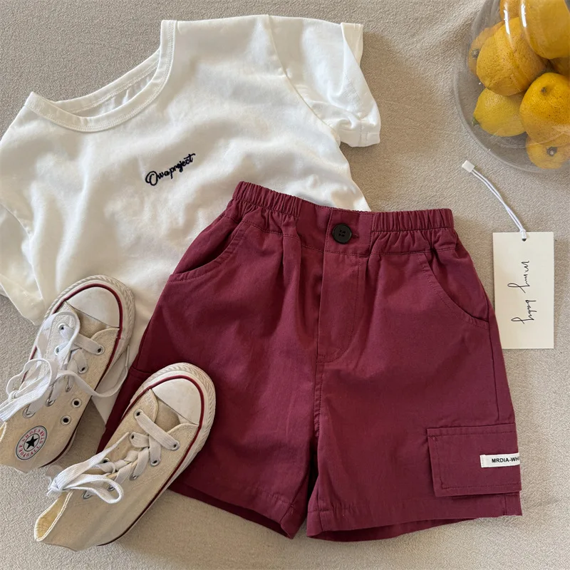 Children's shorts 2025 summer new products boys and girls solid color light board shorts baby versatile five-point pants tide
