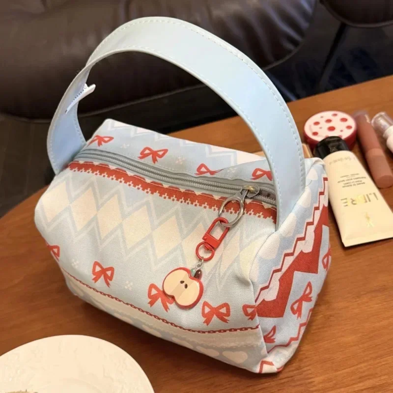 Bolsos de mano con lazo de Apple para mujer, bolsa de maquillaje, bolsa de almacenamiento portátil, mochilas con cremallera con estampado dulce 3D, bolso de mano de viaje de gran capacidad, nuevo