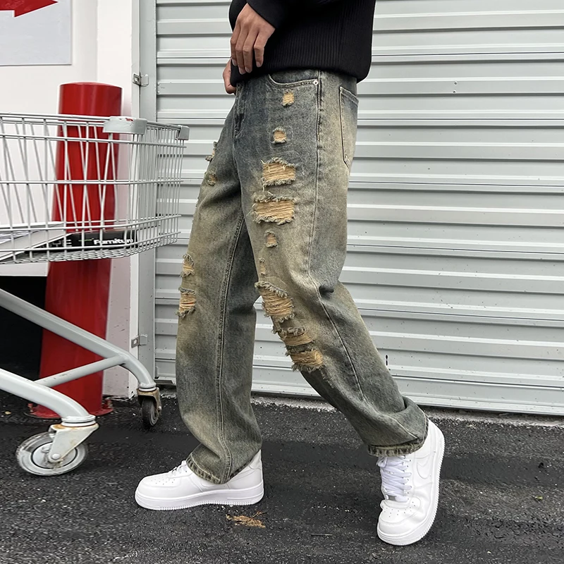 Streetwear hole patches loose straight men's jeans fall and winter models American retro high street tide men's long pants