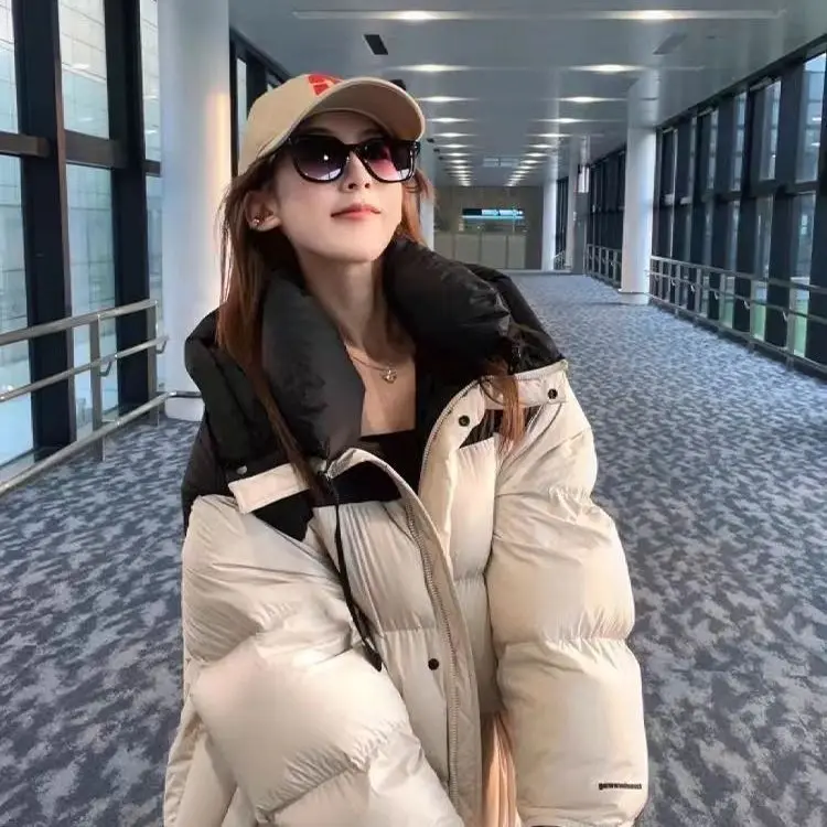 ​ ​ ผ้าฝ้ายหนาเสื้อผู้หญิง 2025 ใหม่ฤดูหนาวยาวด้านล่างเข่าหลวมเสื้อแฟชั่นปักหัวใจรัก ​ ​