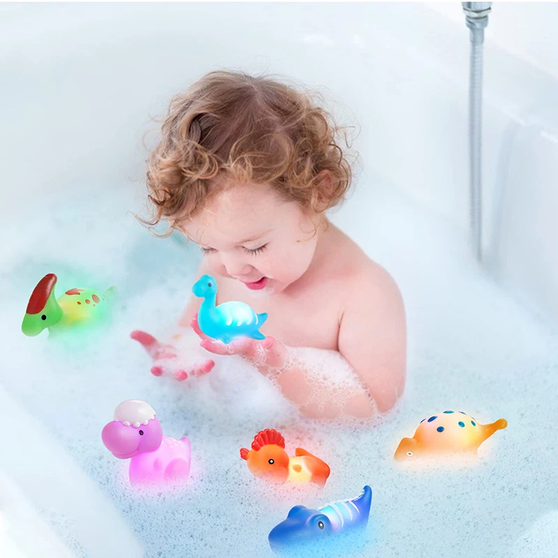 Giocattoli da bagno galleggianti con dinosauri luminosi per bambini luce che cambia colore lampeggiante in vasca da bagno con acqua giocattolo per doccia per bambini regali di natale