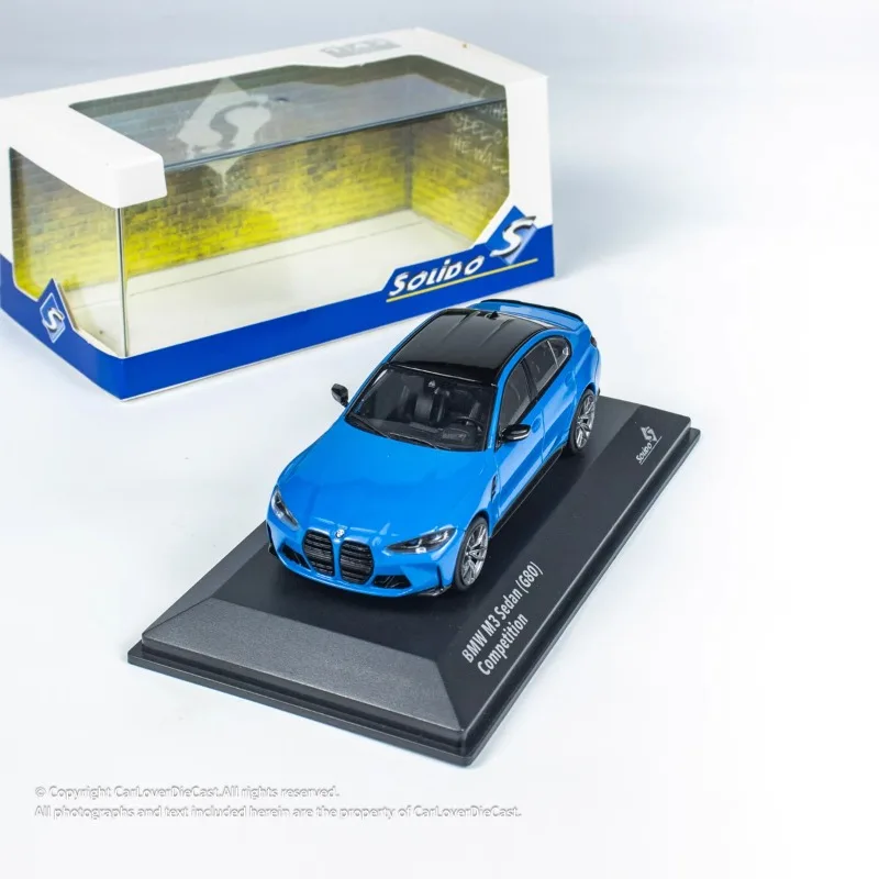 

In stock: 1:43 BMW G80 M3 ISLE OF MAN die-cast alloy car model, Boys' festival gift toy, adult decorative collectible ornament.