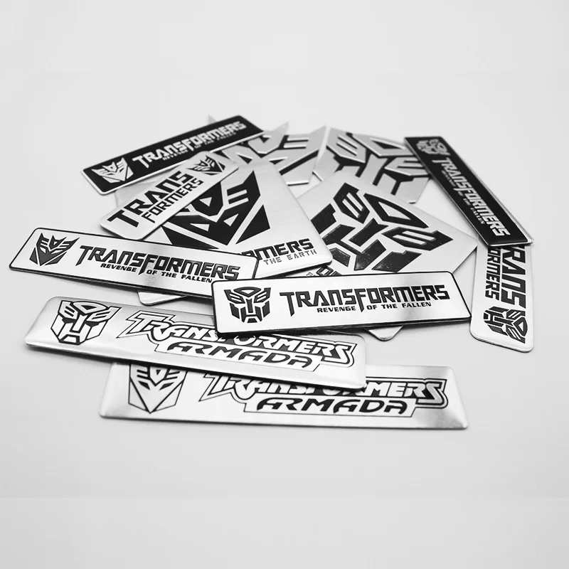 ثلاثية الأبعاد الألومنيوم Autobot محولات جسم السيارة الخلفي الجذع الجانب الحاجز شعار شارة ملصق الديكور الشارات اكسسوارات السيارات التصميم