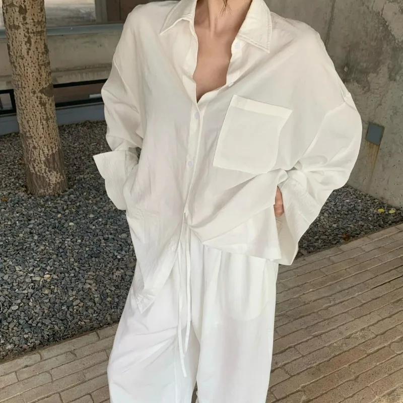 Temperamento blanco Polo Collar camisa Top Slack traje ropa de mujer moda de verano Casual pantalones de pierna ancha conjunto de dos piezas 2025