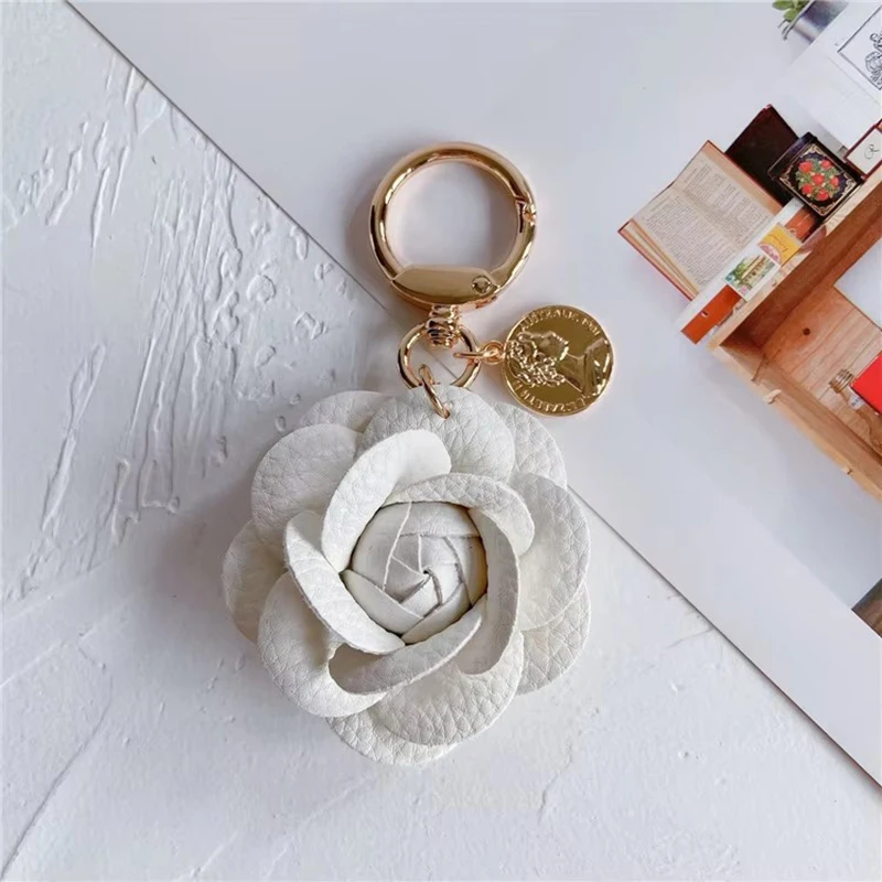 Fashion leather camellia car keychain cute flower backpack pendant accessories personality keychain ring women