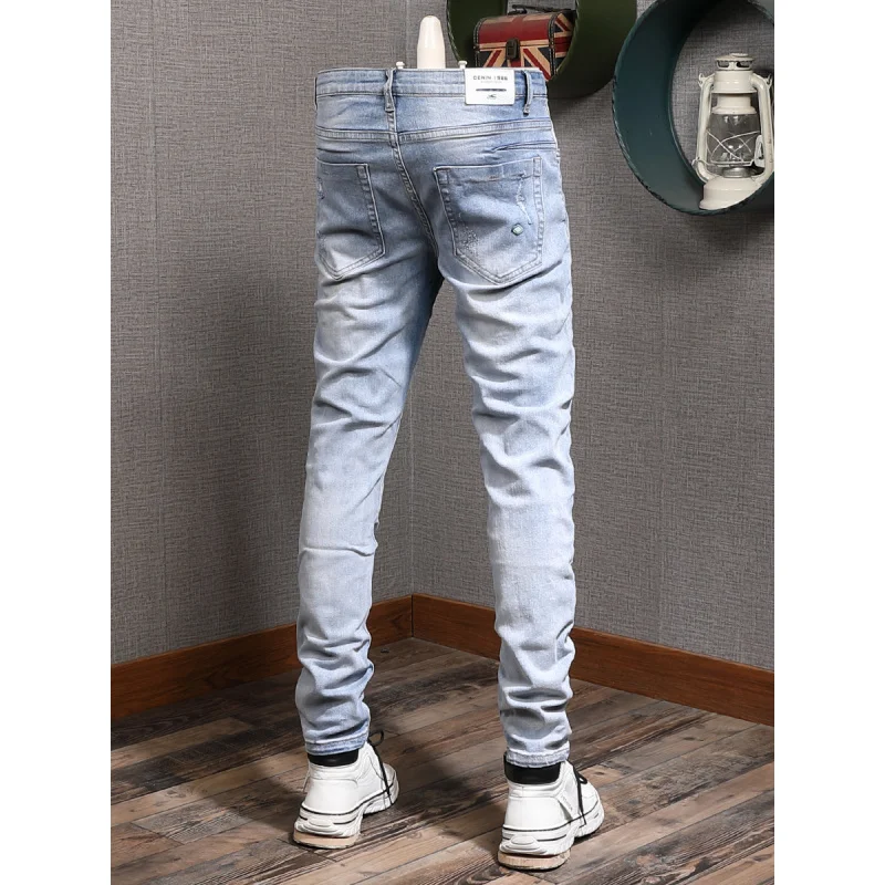 Light colored casual jeans for men, slim fit with small feet and elastic Korean style trendy and versatile casual ripped pants