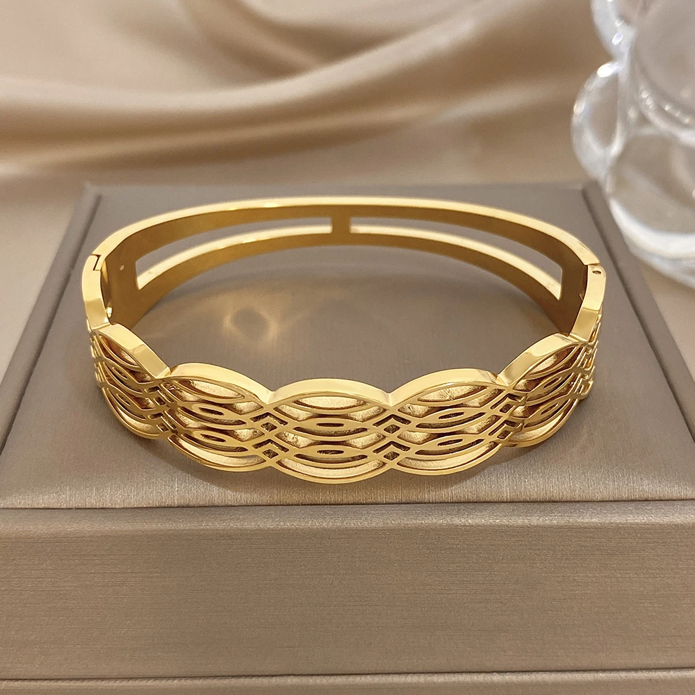 

DODOHAO Creative Ripple Stainless Steel Bangle for Women Hollow Waterproof Gold Plated Spring Bracelet Daily Jewelry Accessories