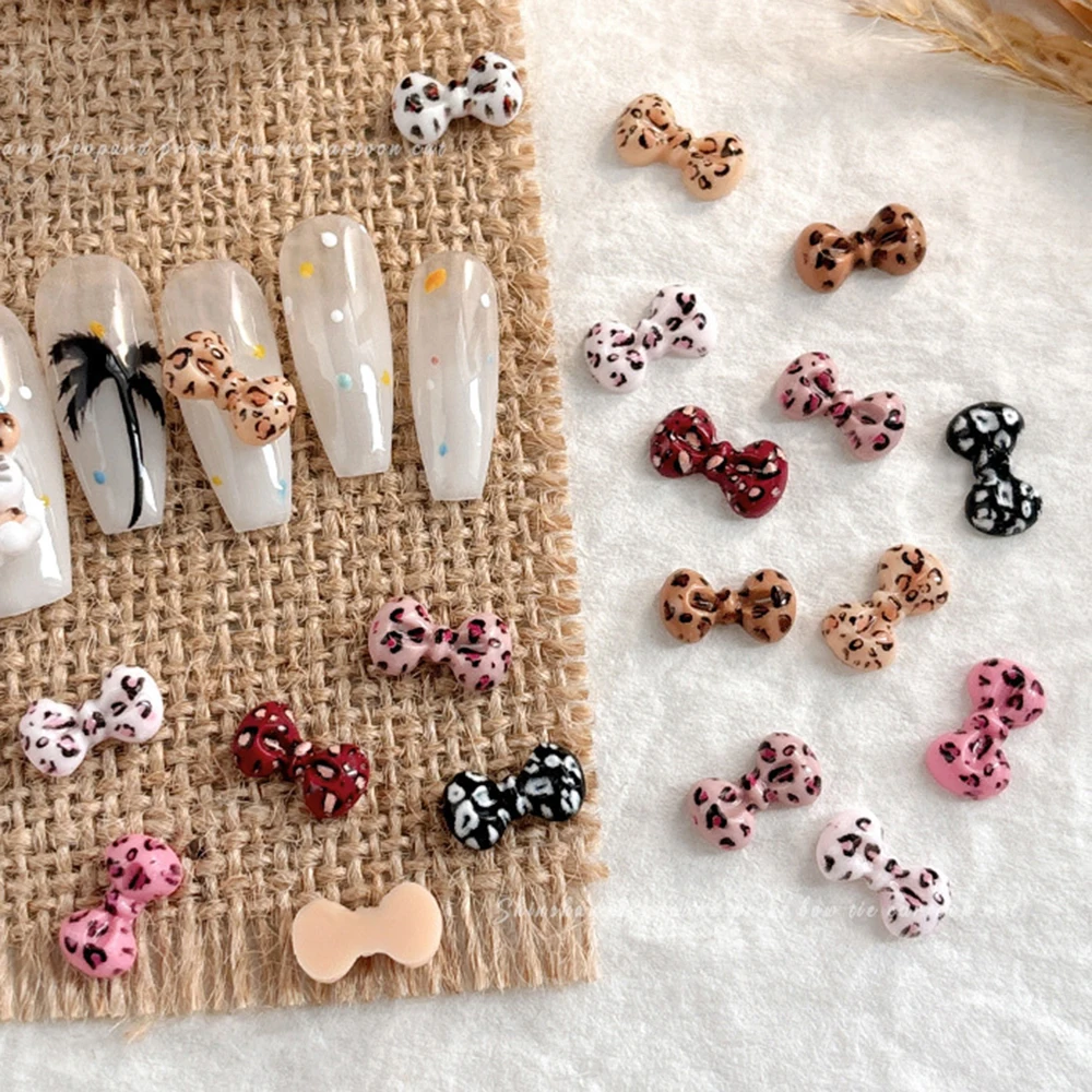 50 Stück Schleife Harz Nail Art Strass Mix Leopard Schleife Nagel Charms für Maniküre DIY Dekorationen Schöne Farbe Leopard Charms