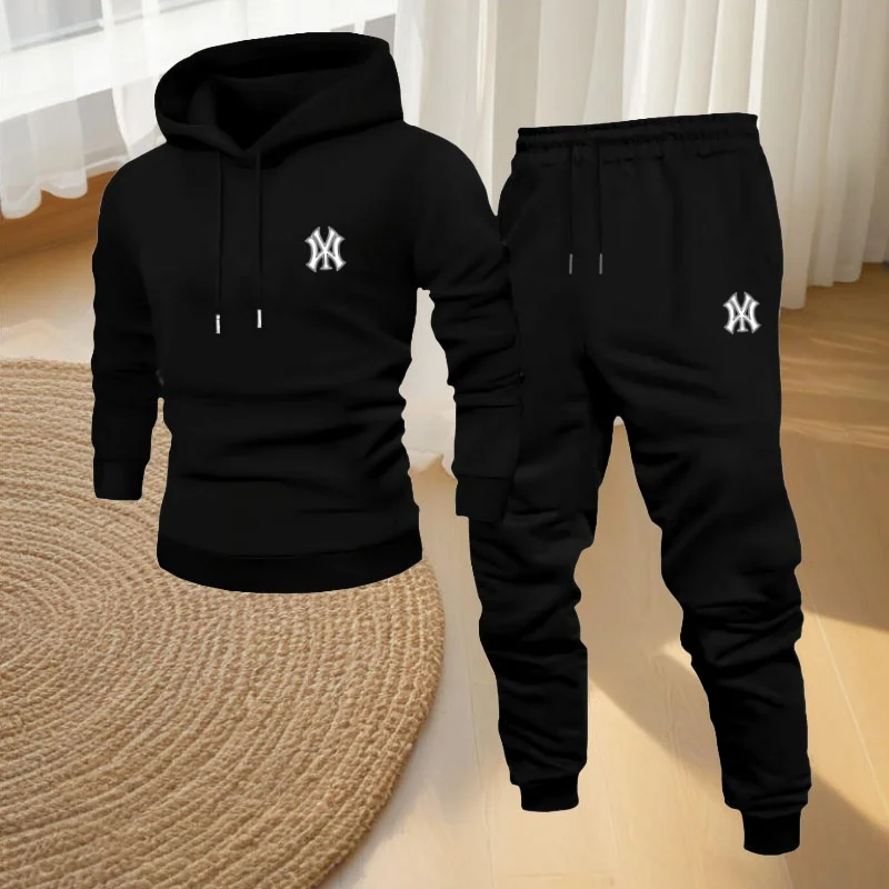 

Men's outdoor fitness dark-colored two-piece outfit, consisting of a long-sleeved sports shirt and casual pants.