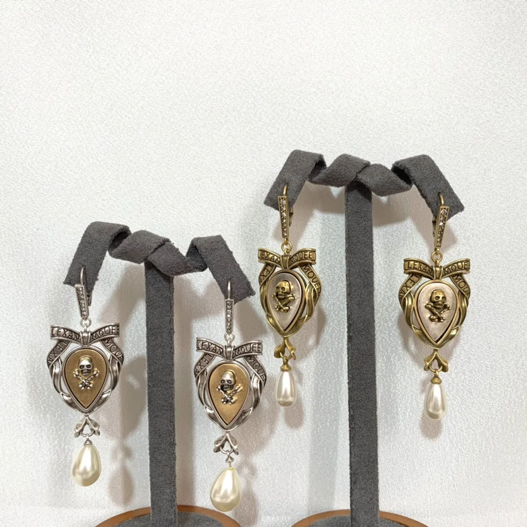 

New Bow Skull Pearl Earrings For Women With A High-end Feel Dark Personality Water Droplet Shaped Color Blocked Ear Buckle