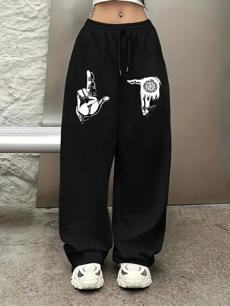 

Черные прямые джоггеры с рисунком молнии — повседневные спортивные брюки с белым принтом, которые можно стирать, удобная посадка на весну/осень