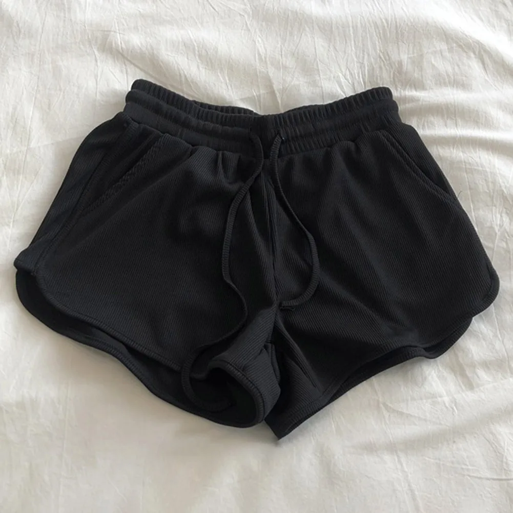 Cómodos pantalones cortos de pierna ancha de color sólido para mujer con detalle de cordones y material de hilo de seda helada para uso en primavera al invierno