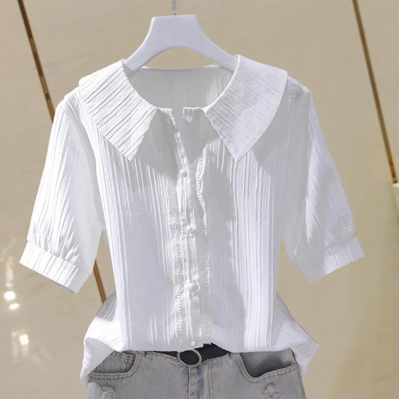 Camisa elegante con cuello Peter Pan para mujer, blusa holgada informal con volantes que combina con todo para oficina, novedad de verano 2023