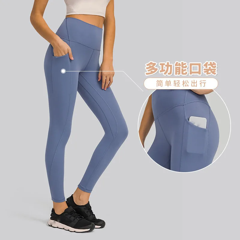 Pantalones de Yoga con bolsillos laterales de malla ajustados para correr, ropa deportiva para glúteos finos y de secado rápido