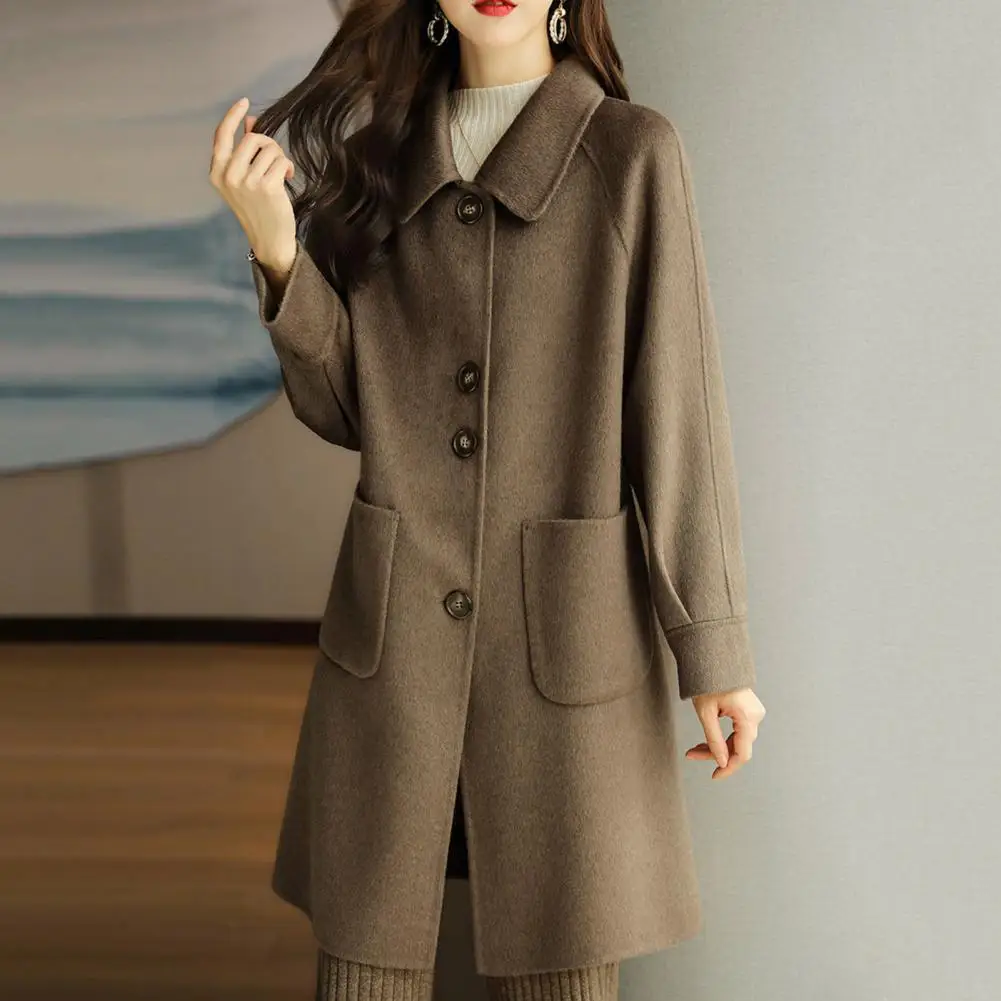 Features: The mid-length jacket adopts a classic single-breasted placket, hand pocket design, elegant lady style.