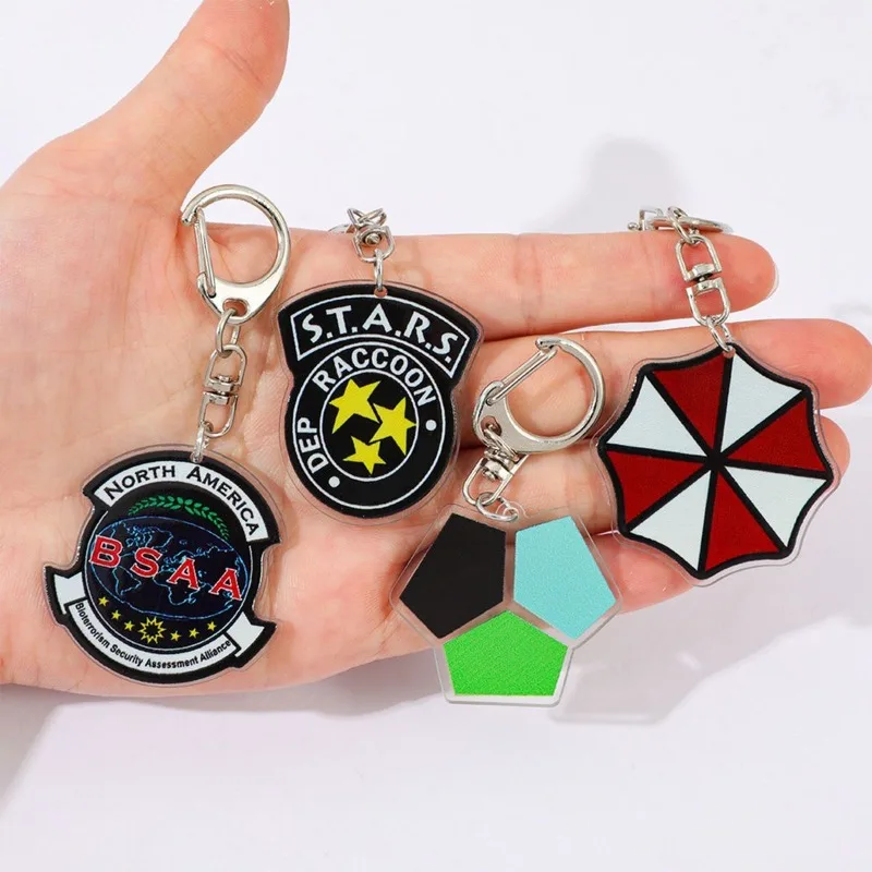 4 llaveros acrílicos de Resident Evil, populares entre los fans de la película, colección de merchandising, dije para mochila, regalo de apoyo, regalos de cumpleaños.