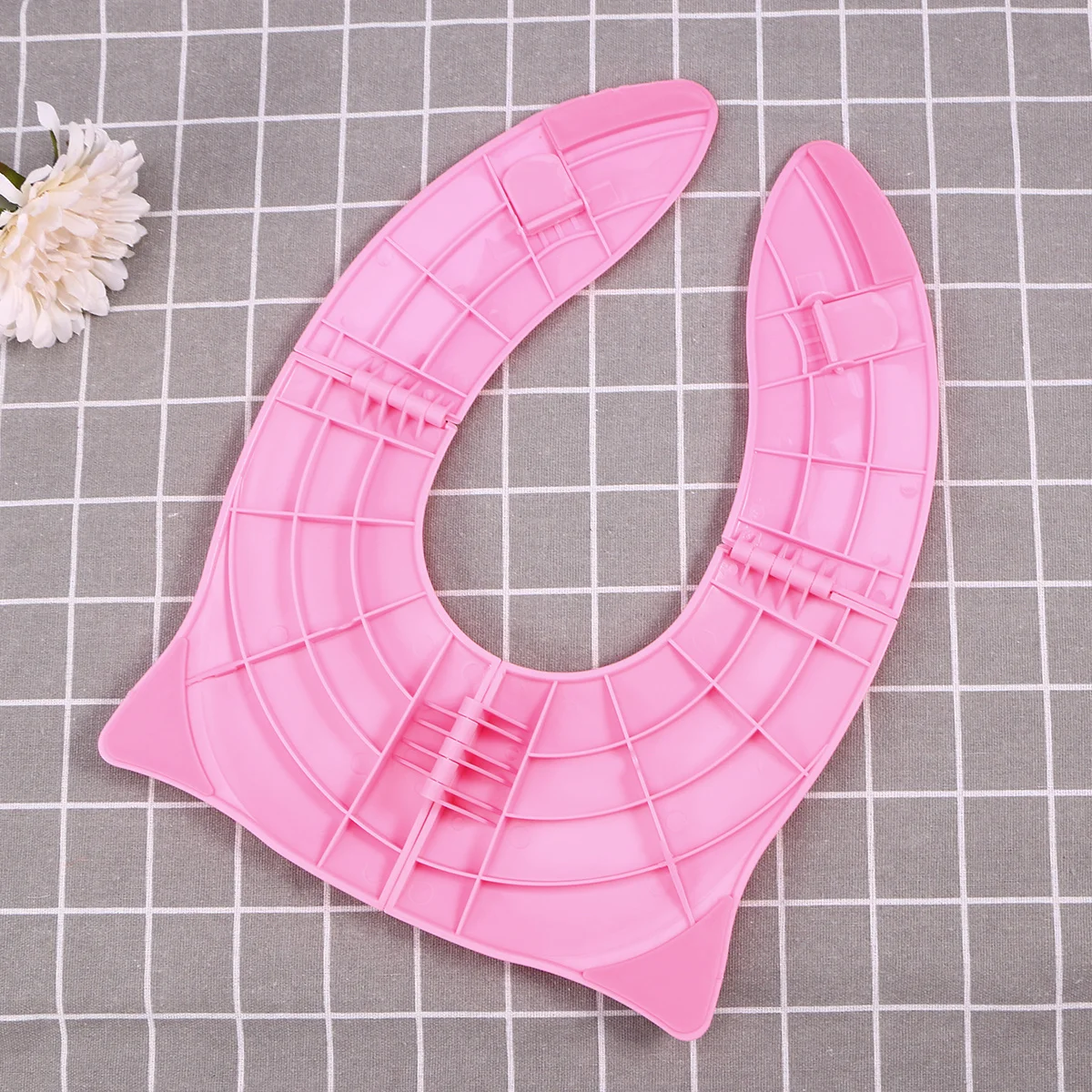 Składane, lekkie i przenośne nakładki na sedes do użytku w podróży, w domu, zimowe, dla dzieci, z motywem małych oczek, różowe.