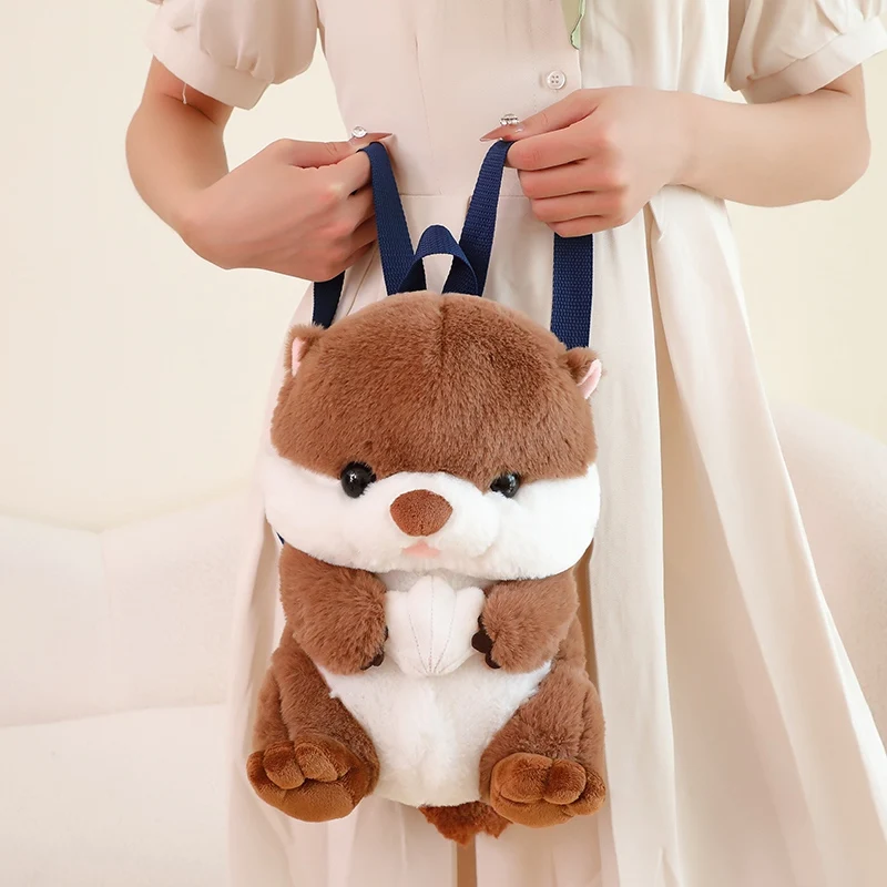 

28CM Kawaii Cartoon Simulation Anime Plush Sea Otter Toy Backpack Holding Shell Children's Sea Otter Doll Holiday Gift