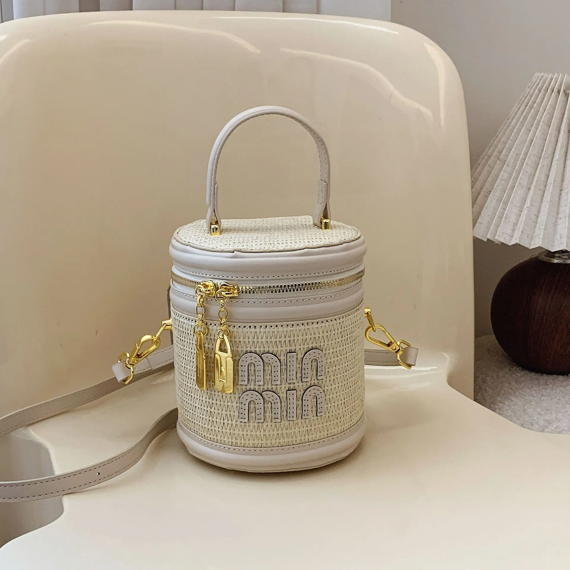

2025 Trendy Korean Woven Cylinder Bag - Minimalist Chic, Niche Design, Shoulder/Crossbody/Handheld