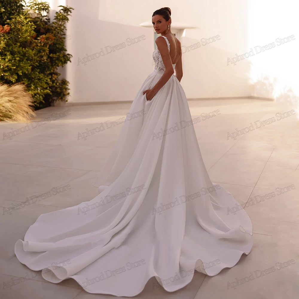 우아한 웨딩 드레스 새틴 신부 가운 레이스 아플리케 민소매 백리스 가운 라인 우아한 매력적인 Vestidos De Novia