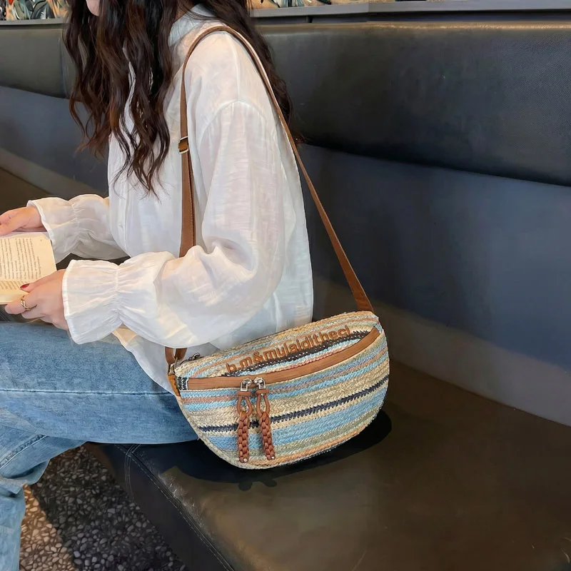 

Textured Embroidered Letter Contrasting Woven Straw Shoulder Bag for Women 2026 New Small Casual Dumpling Female Crossbody Bag