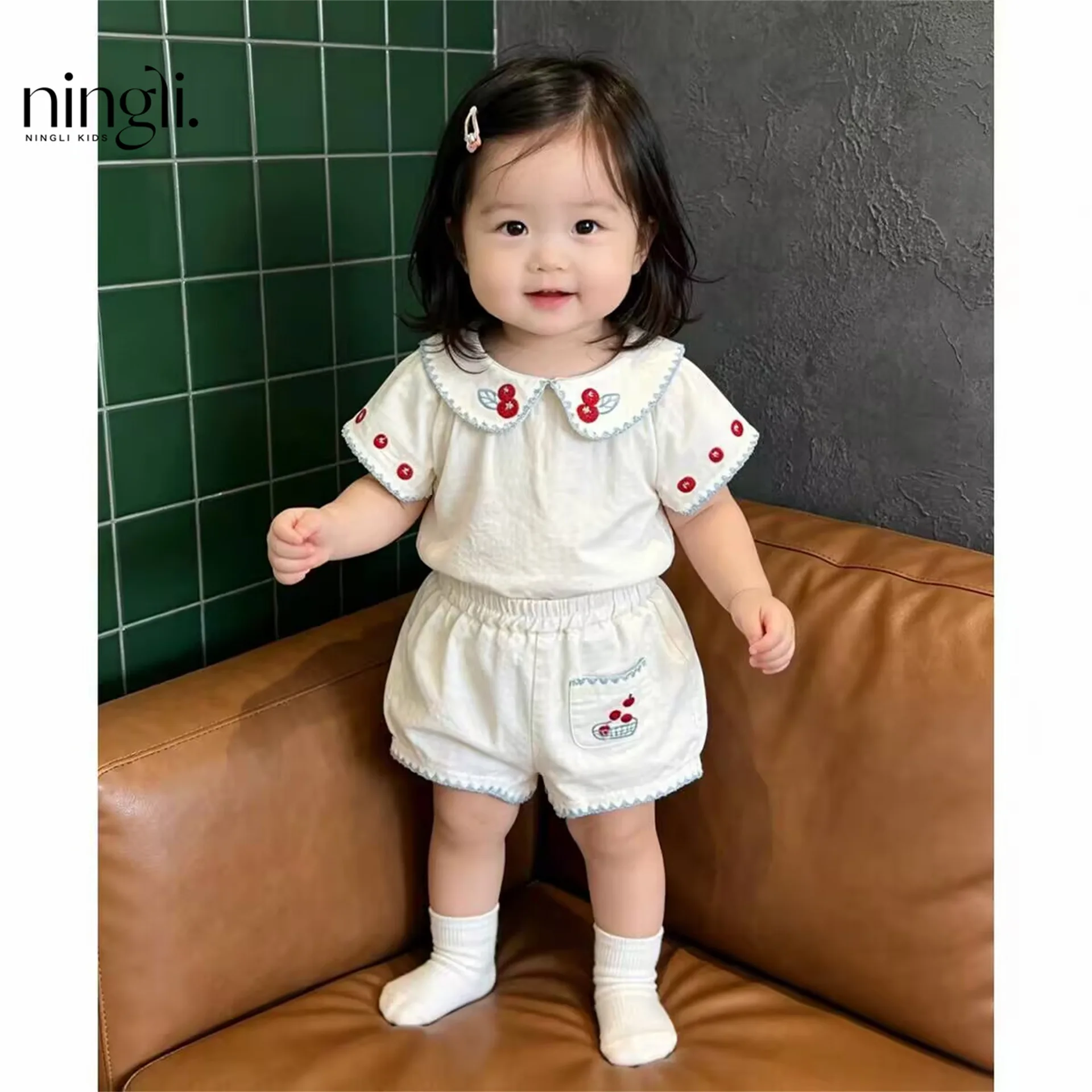 

Baby Girl Summer New Set Cute Doll Collar Top Shorts Two-piece Set Sweet and Stylish Outdoor Wear
