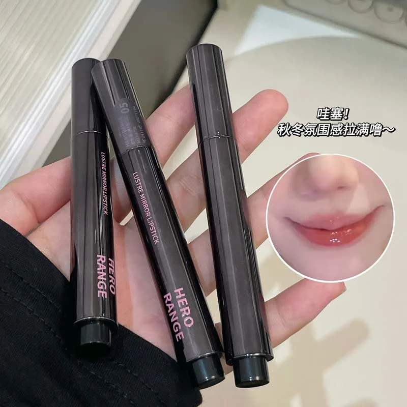 Pink Glow Mirror Lipstick. Smooth Glide, Vivid Pink Hue, Creates Shiny Glass Lip Finish.