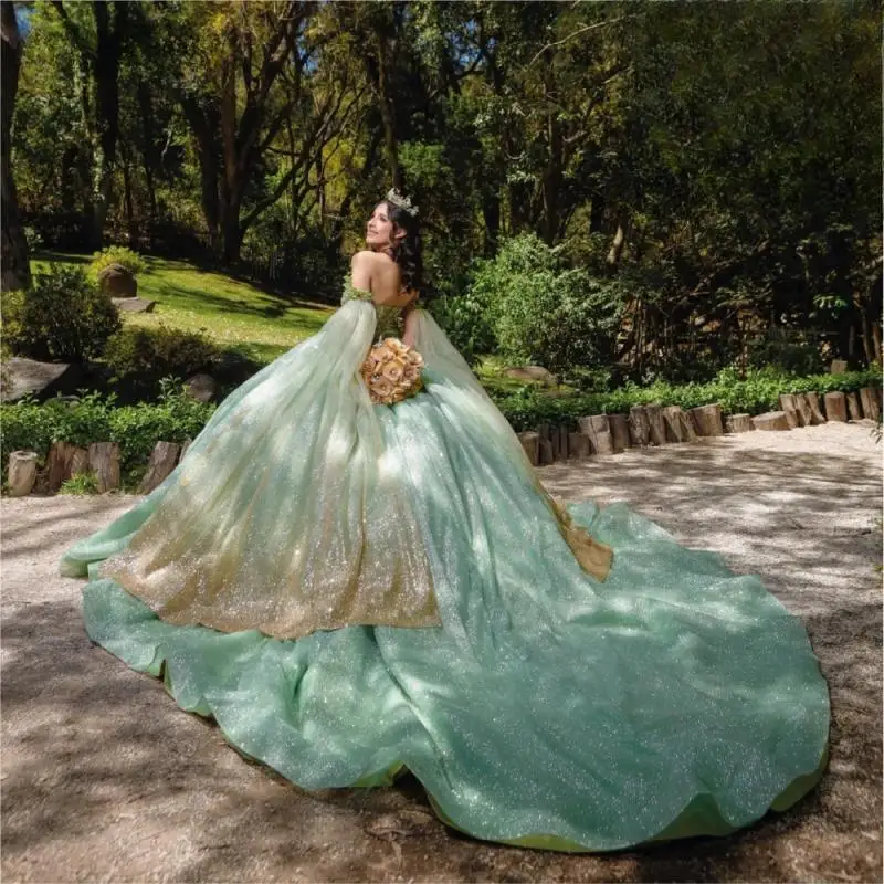 

Sparkly Sage Green Quinceanera Dress Ball Gown Gold Sequins Applique Beading Cape Sweet 16 Vestidos De 15 Años