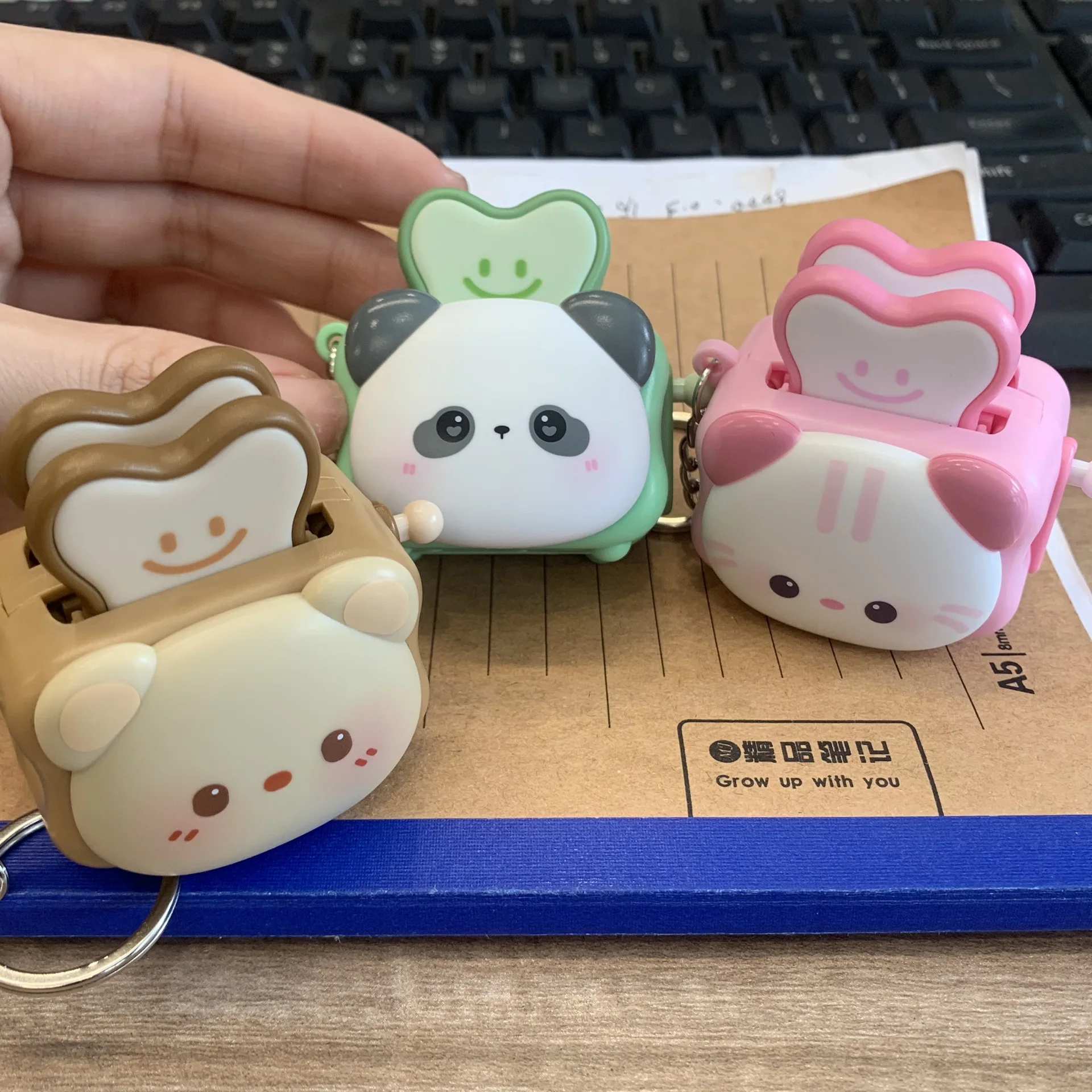 Cartoon animal-shaped fun hand-cranked toast pendant, student bag decoration, stress-relief toaster keychain, bag accessory image 4
