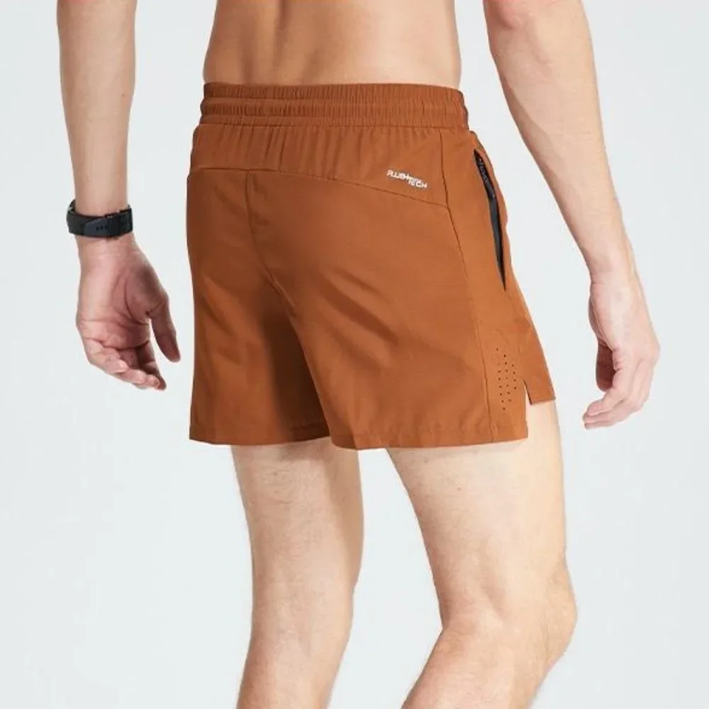 2026quick-drying sports shorts men's breathable mesh fitness pants running marathon track and field three-point pants 4006