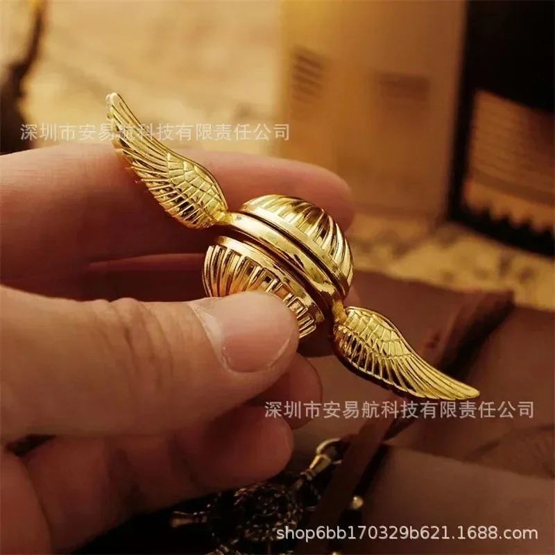 Harries Potters Golden Snitch Fidget Spinner, juguetes para aliviar el estrés, alas de Cupido, rotación de la punta del dedo, regalos portátiles de reducción