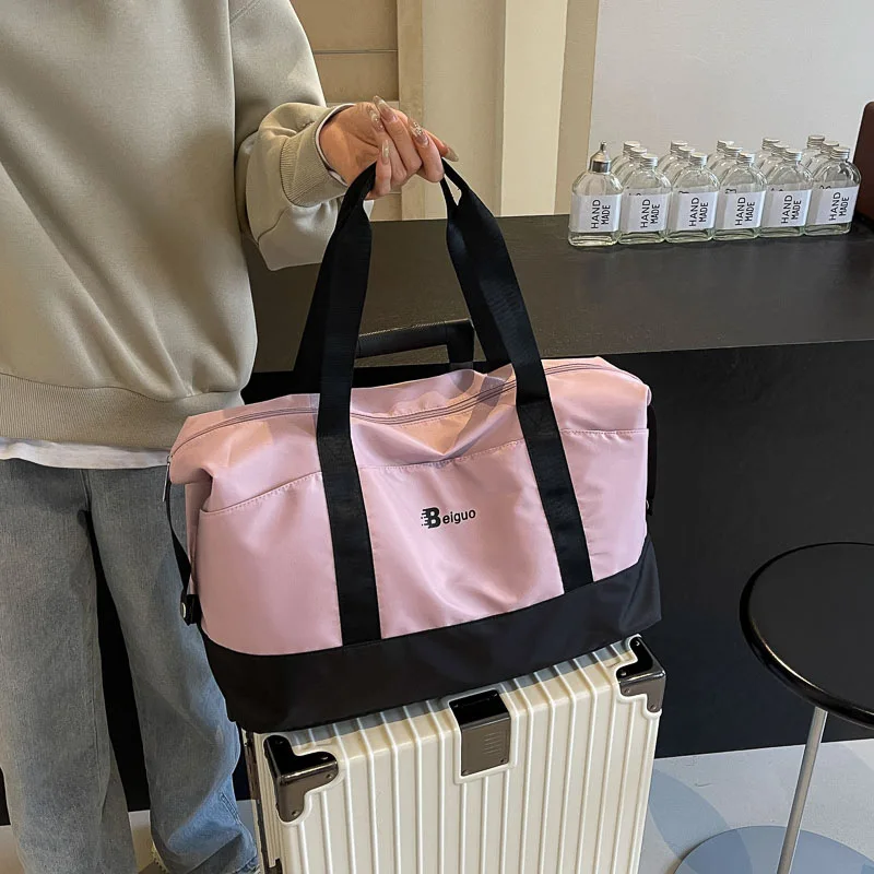 

Large Capacity Carry On Travel Bag Lightweight Duffle Bag for Women Large Capacity Travel Duffle Bags for Weekend Trip, Gym Tote