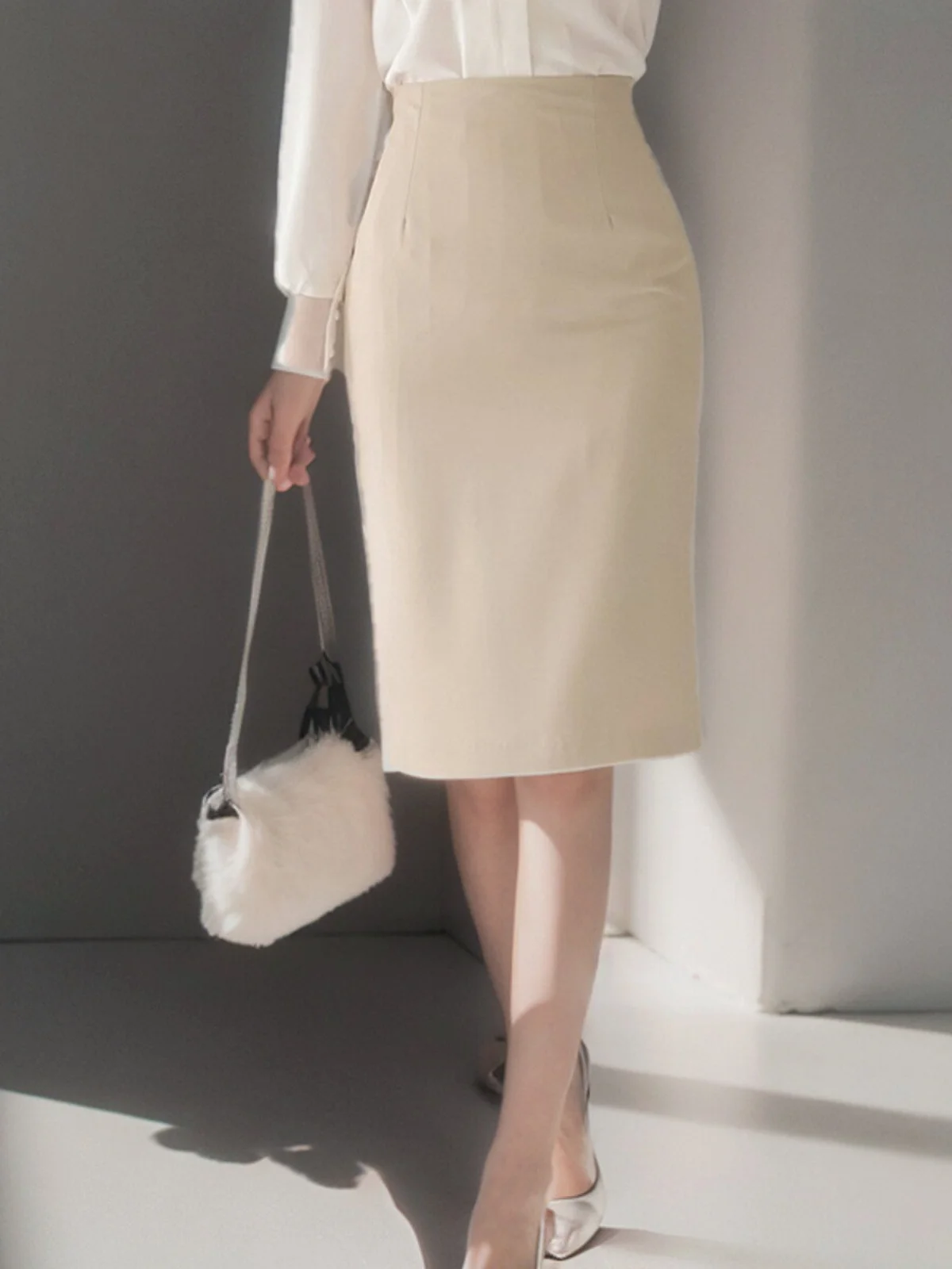 

Цвет шампанского, женская юбка средней длины с высокой талией, одношаговая юбка трапециевидной формы для офисной карьеры, юбка прямого кроя с асимметричным подолом