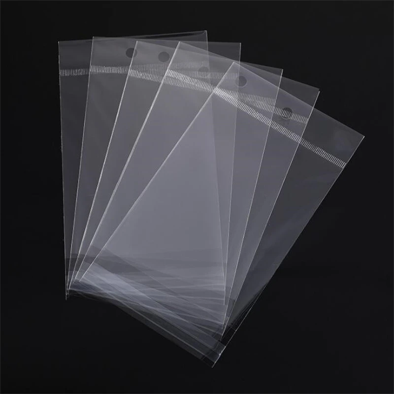 Sac en plastique Transparent refermable, 100 pièces, sac d'emballage pour cadeau, bijoux, sac en Cellophane OPP autocollant