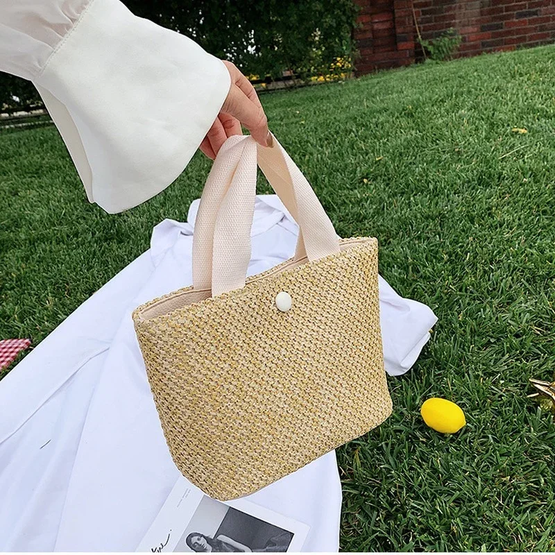 2023 New Rural Style Woven Bag Retro Leisure Handheld Grass Woven Bag Summer Beach Vacation Bag for Women