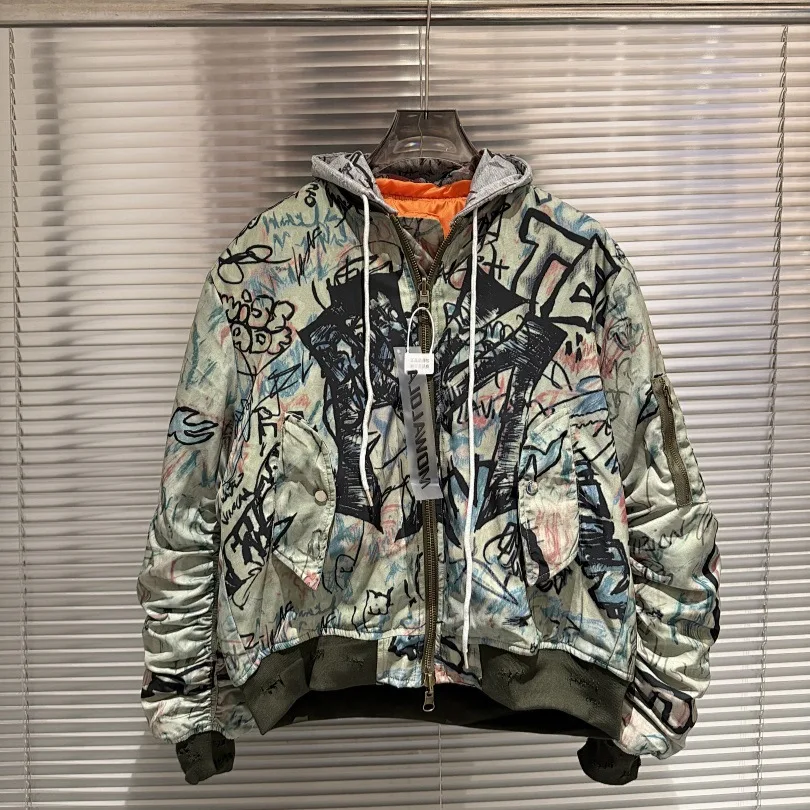 

Mowalola City hand-painted graffiti damages the hooded cotton jacket and the 6-number Bomber jacket
