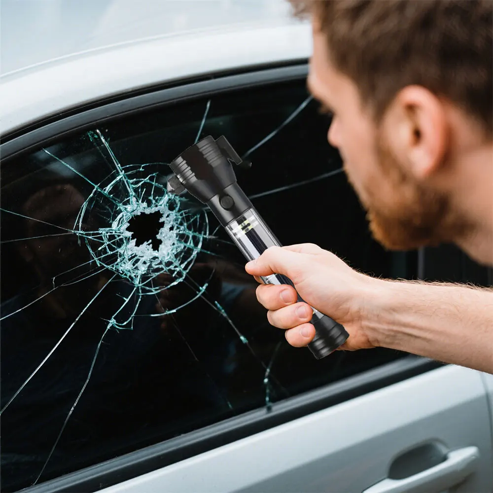

1 emergency window breaking flashlight in the car, solar safety hammer flashlight can be used as a power bank