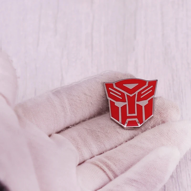 Trans-formers Autobot-Logo Mecha Robot spilla smaltata spilla per vestiti spille su zaino valigetta distintivo decorazione gioielli