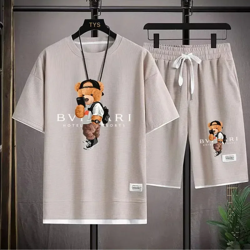 

A new summer fashion men's short-sleeved round-neck T-shirt and sports shorts two-piece set, running and fitness sportswear