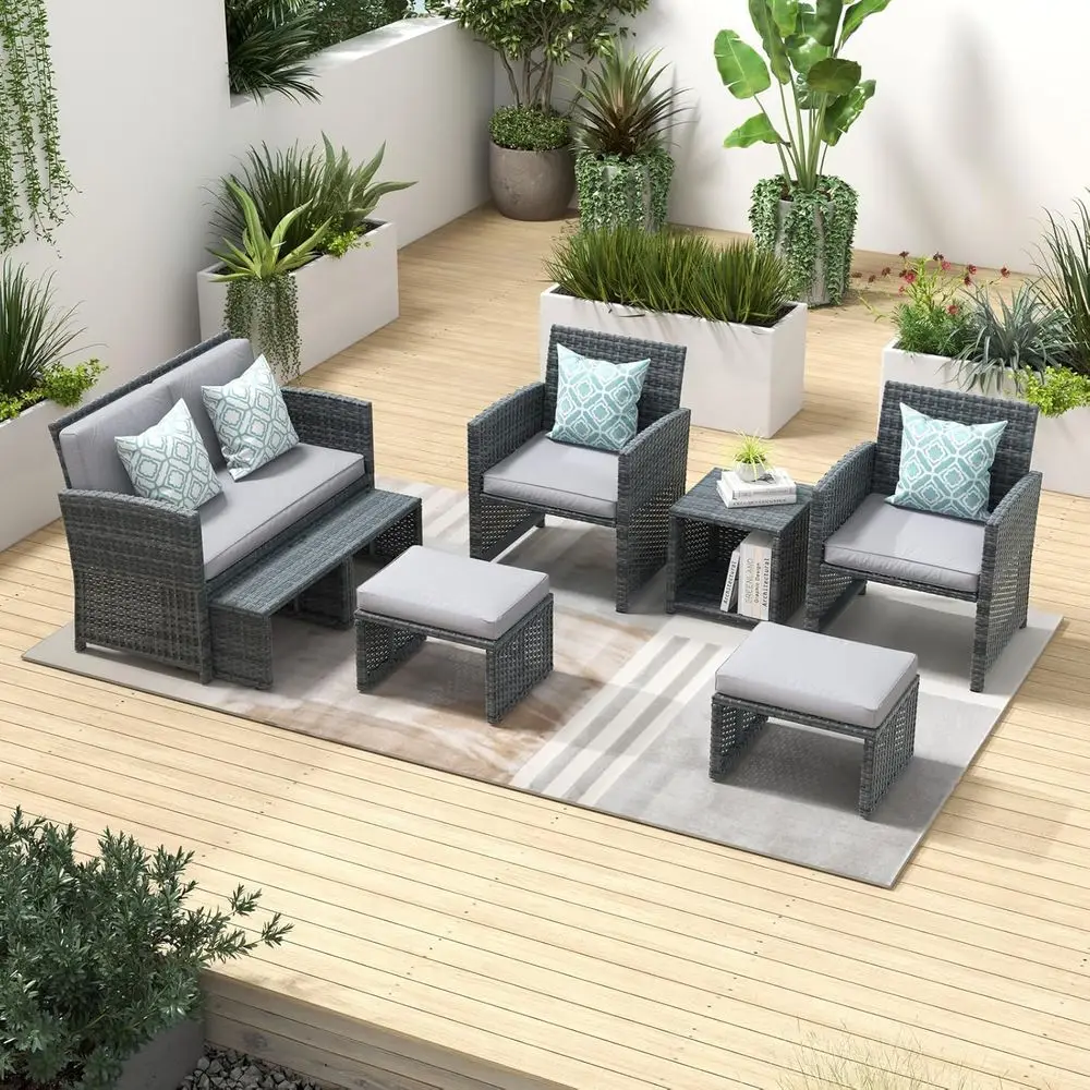 

8-местный комплект для улицы из плетеного ротанга: секционный диван, пуф и кофейный столик в сером цвете с светло-серыми подушками