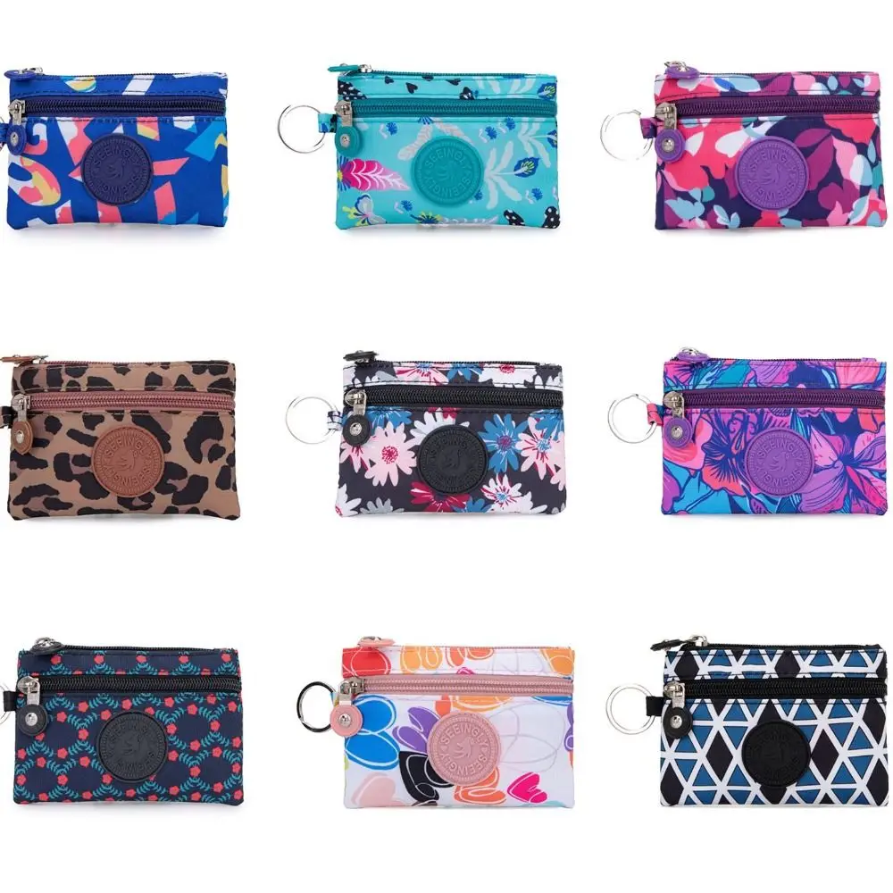 กระเป๋าใส่เหรียญผ้าแคนวาสแบบใหม่พร้อมพวงกุญแจ ลายดอกไม้ ช่องใส่บัตร กันน้ำ ทนทานต่อการสึกหรอ สำหรับผู้ชายและผู้หญิง