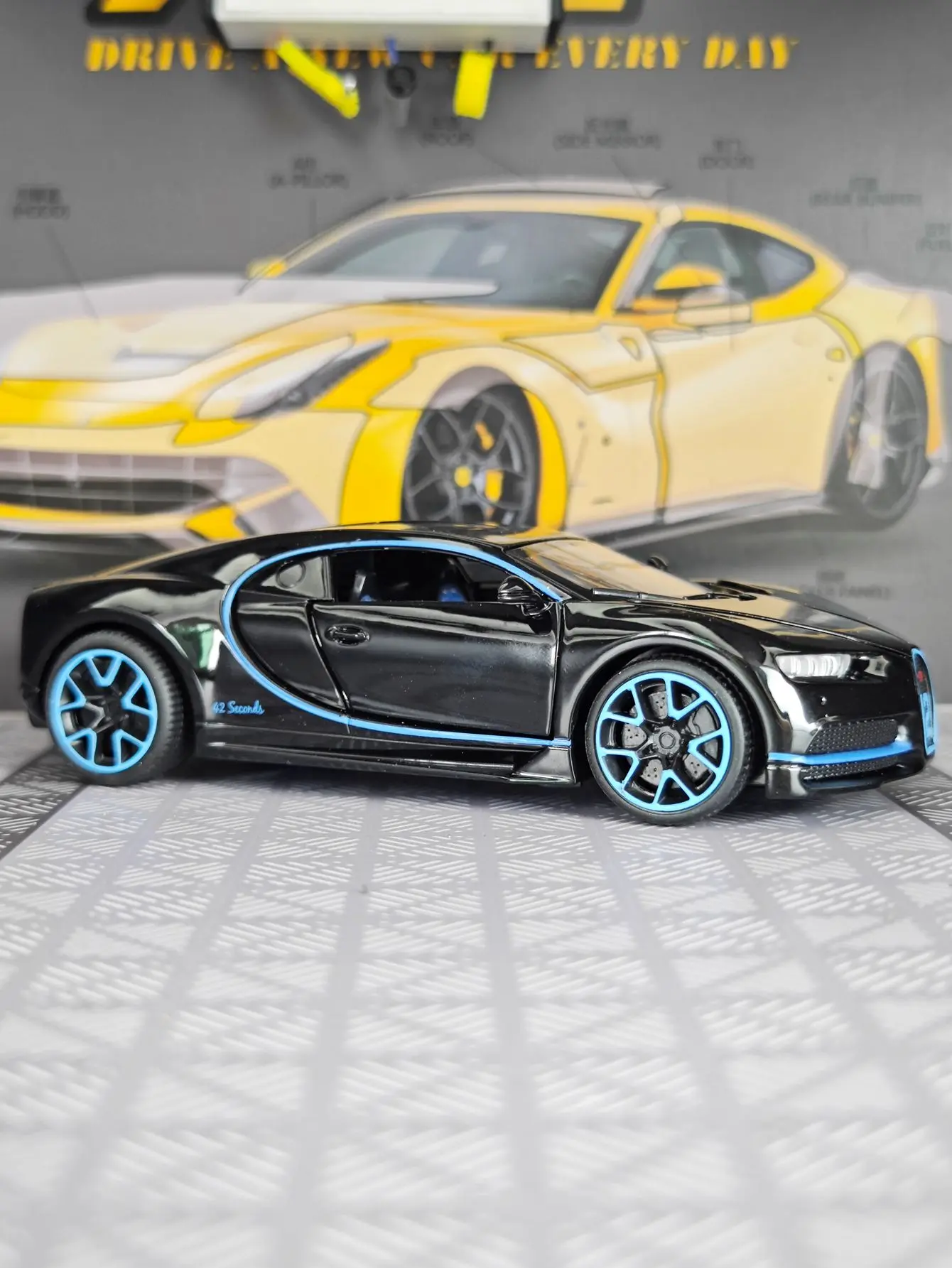 

Модель автомобиля Bugatti Chiron из сплава металлов в масштабе 1:32, двери открываются, есть звуковые и световые эффекты, детализированная отделка, высокое качество изготовления.
