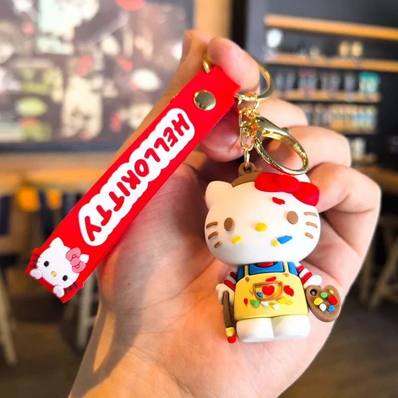 クリエイティブな韓国のかわいい漫画ハローキティシリーズキーホルダーペンダントPVCドールカーキーホルダーペンダントカップルバックパックキーホルダーペンダント