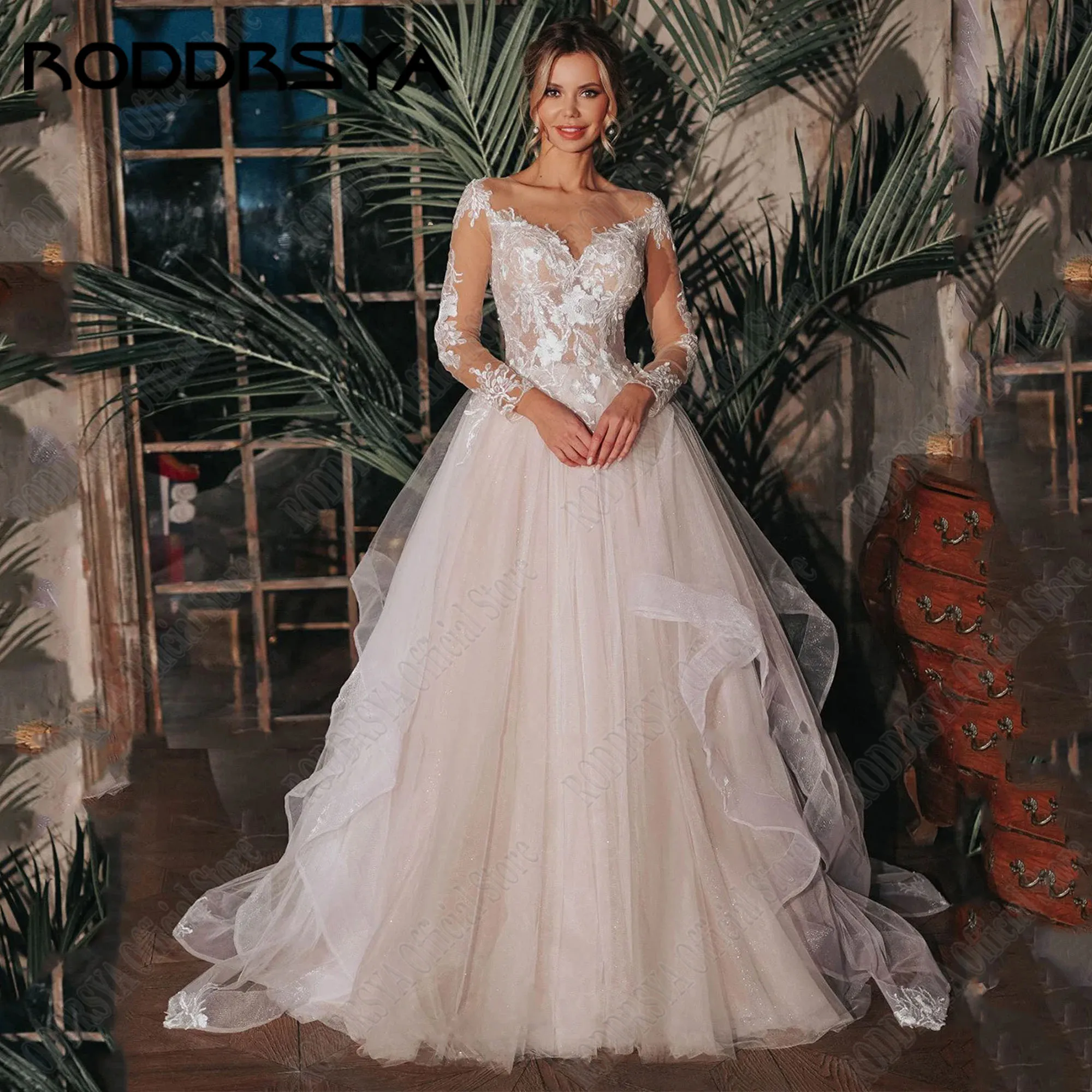 

RODDRSYA Glitter Tulle O-Neck Wedding Dress 2024 Bride Long Sleeves A-Line Vestidos De Novia Applique Button Lace Bride Gowns