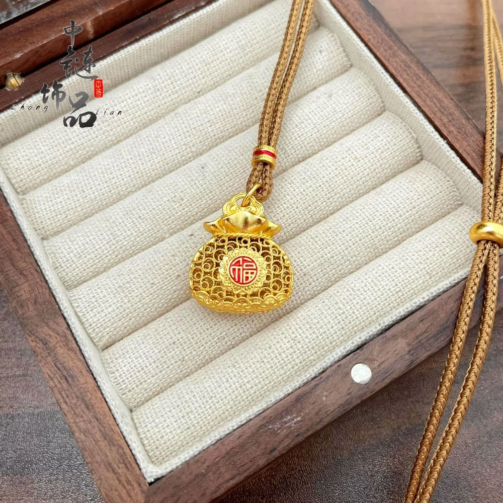 Enamel hollow silk Fu Zi Fu bag pendant 9999gold