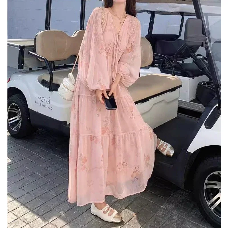 Kobiety Koreańska moda Sznurowane sukienki z kwiatowym nadrukiem Słodkie eleganckie sukienki z wysokim stanem V Szyja z długim rękawem Luźna sukienka plażowa Maxi Vestidos