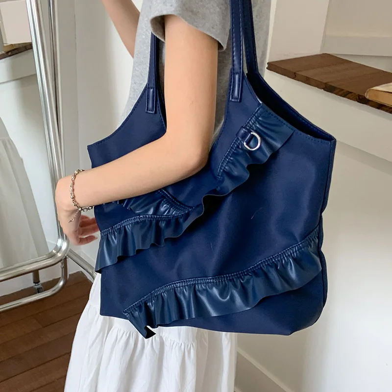 Bolso grande 2025 nuevo bolso de mano informal versátil para ir al trabajo en el aula bolso de hombro de gran capacidad